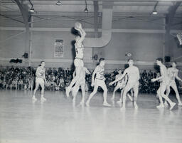 (128-06) Basketball NMC vs. Michigan Tech Feb. 24, 1960: Jump Shot by Northern Player