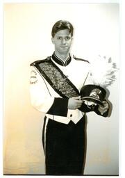 Marching Band Member Posing with Hat (Part of the NMU Historic Photographs Collection)