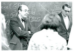 Two Men Speak to Class (Part of the NMU Historic Photographs Collection)