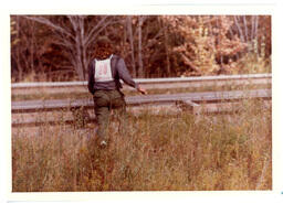 Competitor Approaching Guard Rail next to Road (Part of the NMU Historic Photographs Collection)