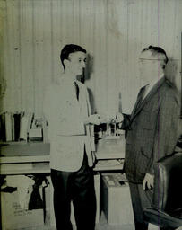 Season Ticket Sales 1960: Usher Hands Patron a Ticket Backstage (?)