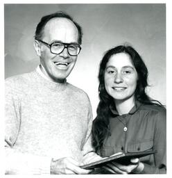 Tom Emerich Giving Dianne LeBent a Plaque (Part of the NMU Historic Photographs Collection)