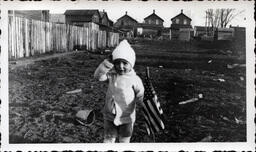 Young Thomas E. Ross Saluting Mini Flag