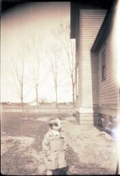 (132-011) Young Boy in Overcoat