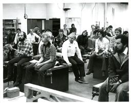 Class Sitting on Desks in Workshop (Part of the NMU Historic Photographs Collection)