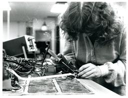 Student Soldering Electronics and Wires (Part of the NMU Historic Photographs Collection)