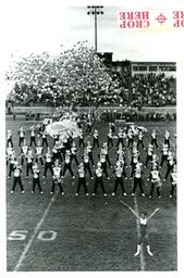 Marching Band Performing while Releasing Balloons (Part of the NMU Historic Photographs Collection)