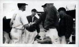 Blurry Photo of Baseball Players Shaking Hands