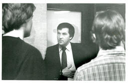 Man Speaking with Two Students (Part of the NMU Historic Photographs Collection)