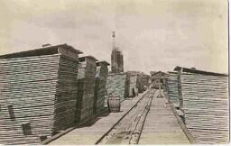 Lumber Stacks and Railroad Tracks at Thompson Mill