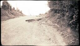 (024-022) Caved-in Section of M-64 after Flood