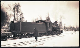 Man Smoking by Locomotive