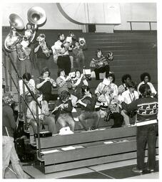 Pep Band Playing on Gym Bleachers (Part of the NMU Historic Photographs Collection)