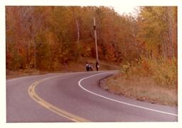 Group of Competitors Walking along Road (Part of the NMU Historic Photographs Collection)