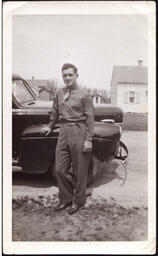 Man (Norman Fabry?) next to Car