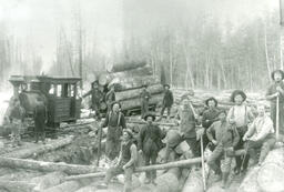 William A. Holmes and Son logging crew after loading a railway car