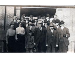 Large Group Portait Outside Brick Building